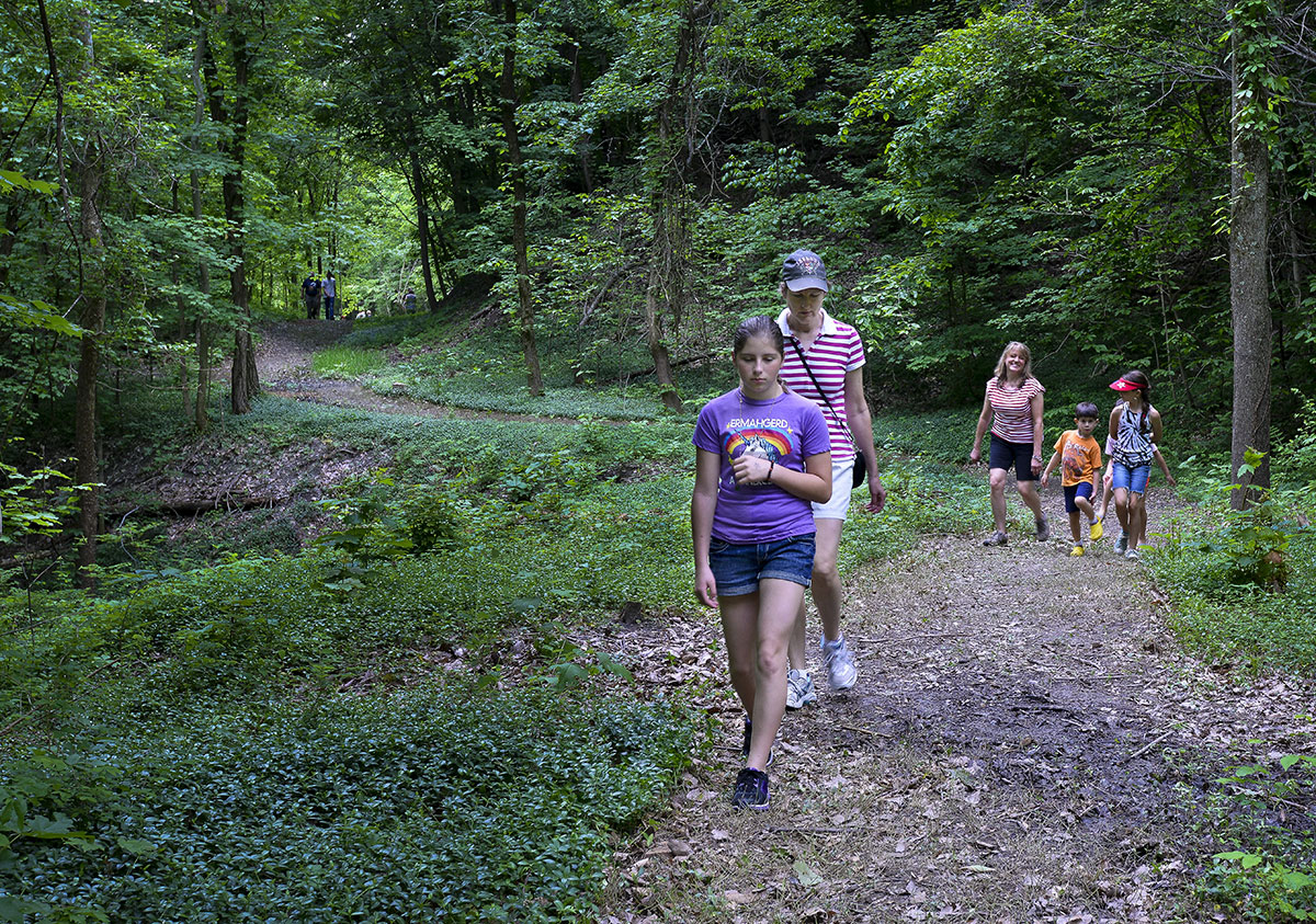 Emma Stein and family hiking the old trolley car line trail.